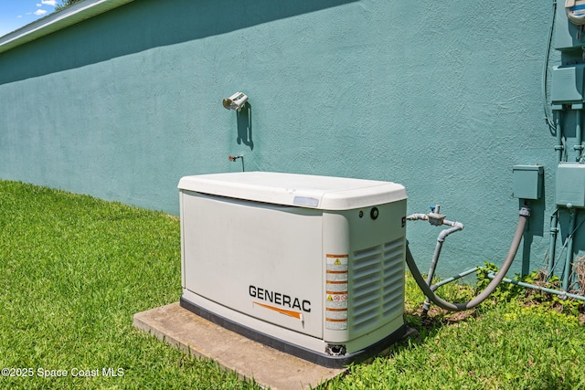 2719 Alicia Ln, Melbourne, FL 32935 - exterior view of a power unit and stucco siding