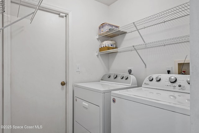 2719 Alicia Ln, Melbourne, FL 32935 - washroom featuring washing machine and dryer