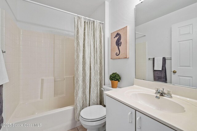 2719 Alicia Ln, Melbourne, FL 32935 - bathroom with shower / bath combo, vanity, and toilet