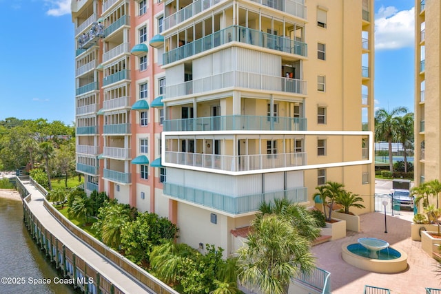 104 Riverside Dr Unit 301, Cocoa, FL 32922 - view of apartment building / complex with a water view