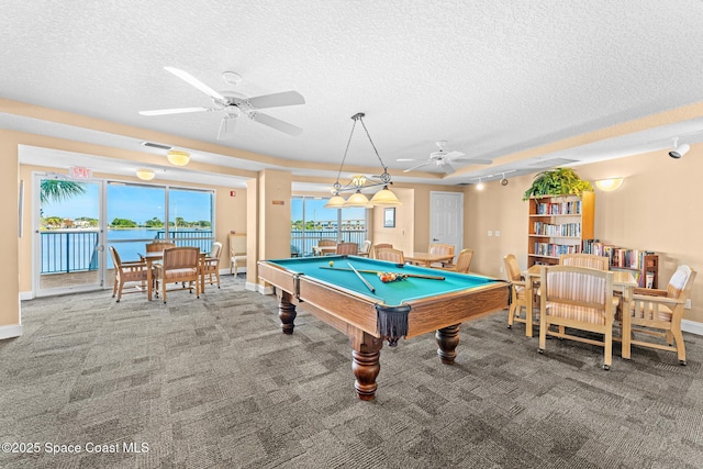 104 Riverside Dr Unit 301, Cocoa, FL 32922 - game room featuring ceiling fan, a textured ceiling, carpet, billiards, and baseboards