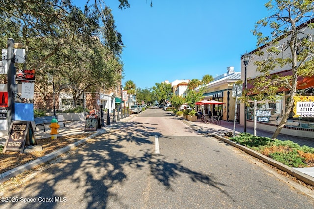104 Riverside Dr Unit 301, Cocoa, FL 32922 - view of asphalt street with a residential view
