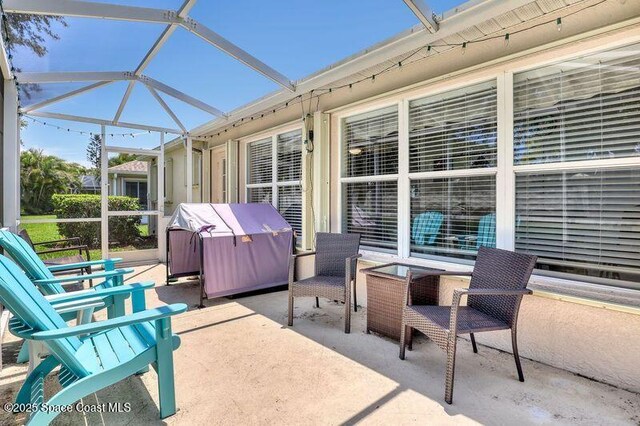 1545 Boca Rio Dr, Melbourne, FL 32940 - view of patio with glass enclosure