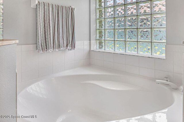 1545 Boca Rio Dr, Melbourne, FL 32940 - bathroom with a bath