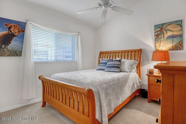 1545 Boca Rio Dr, Melbourne, FL 32940 - carpeted bedroom with a ceiling fan and baseboards