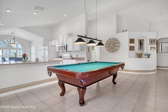 1545 Boca Rio Dr, Melbourne, FL 32940 - game room featuring high vaulted ceiling, pool table, light tile patterned floors, and baseboards
