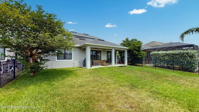 8051 Strom Park Dr, Melbourne, FL 32940 - rear view of property featuring outdoor lounge area, stucco siding, a ceiling fan, and a patio area