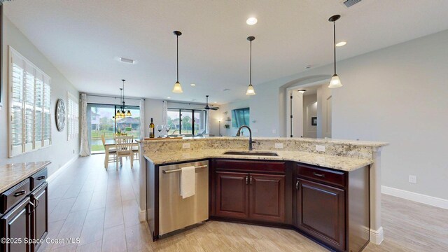 8051 Strom Park Dr, Melbourne, FL 32940 - kitchen featuring a sink, dishwasher, light wood-style floors, and recessed lighting