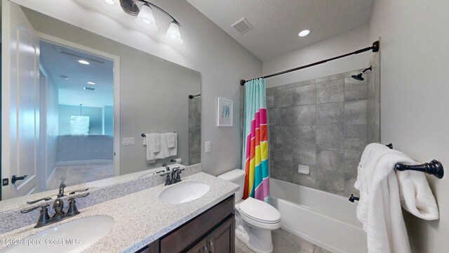 8051 Strom Park Dr, Melbourne, FL 32940 - full bathroom featuring shower / tub combo with curtain, double vanity, and toilet