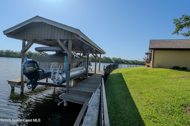 260 Cadiz Ct, Merritt Island, FL 32953 - dock area featuring boat lift, a lawn, and a water view