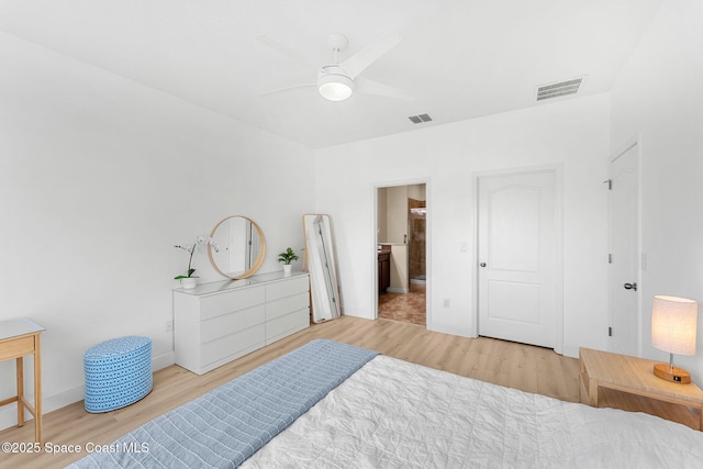 5928 Van Ness Dr, Melbourne, FL 32940 - bedroom featuring wood finished floors, baseboards, connected bathroom, and a ceiling fan