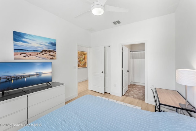 5928 Van Ness Dr, Melbourne, FL 32940 - bedroom featuring wood finished floors, a ceiling fan, and baseboards