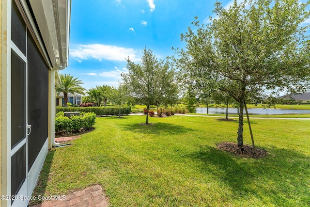 5928 Van Ness Dr, Melbourne, FL 32940 - view of grassy yard with a water view