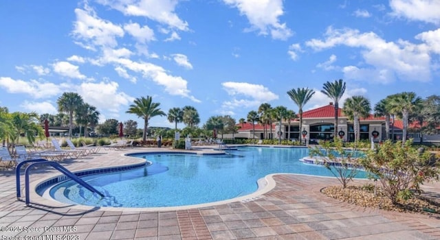5928 Van Ness Dr, Melbourne, FL 32940 - community pool with a patio