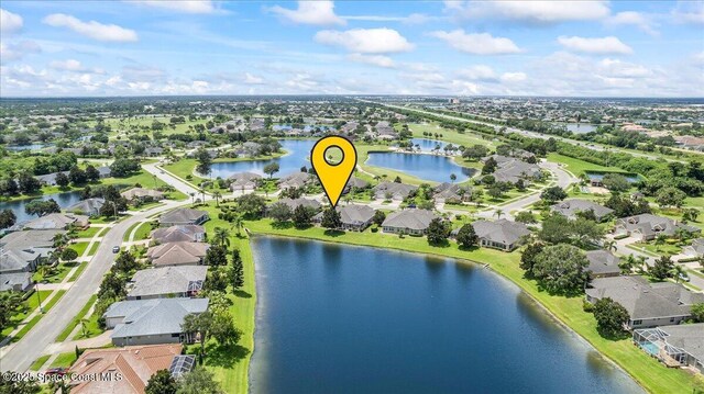 4160 Aberdeen Cir, Rockledge, FL 32955 - aerial view of property and surrounding area with nearby suburban area and a large body of water