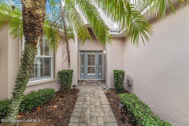4160 Aberdeen Cir, Rockledge, FL 32955 - view of exterior entry with stucco siding