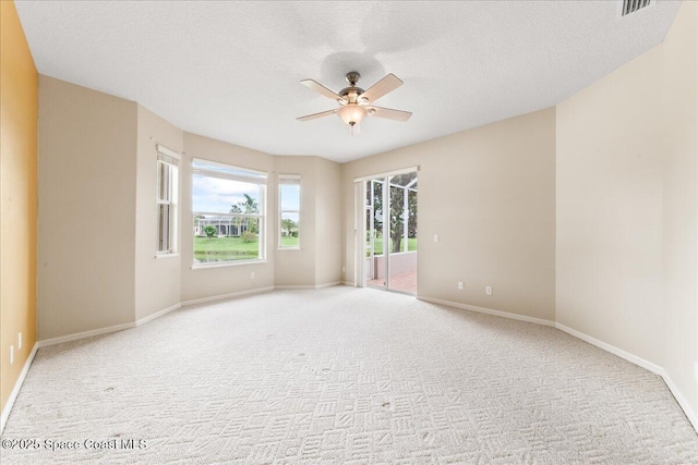 4160 Aberdeen Cir, Rockledge, FL 32955 - empty room featuring light carpet and a ceiling fan