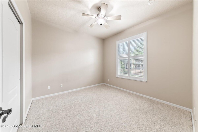 4160 Aberdeen Cir, Rockledge, FL 32955 - unfurnished room featuring carpet, ceiling fan, and a textured ceiling