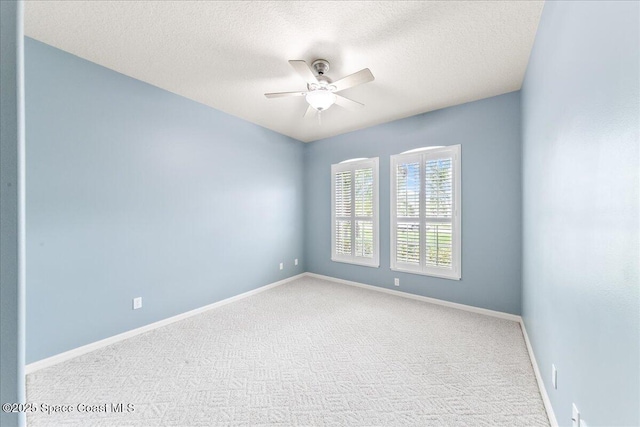 4160 Aberdeen Cir, Rockledge, FL 32955 - carpeted spare room with ceiling fan and a textured ceiling