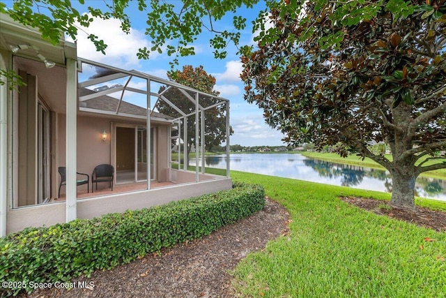 4160 Aberdeen Cir, Rockledge, FL 32955 - view of grassy yard with a water view and glass enclosure