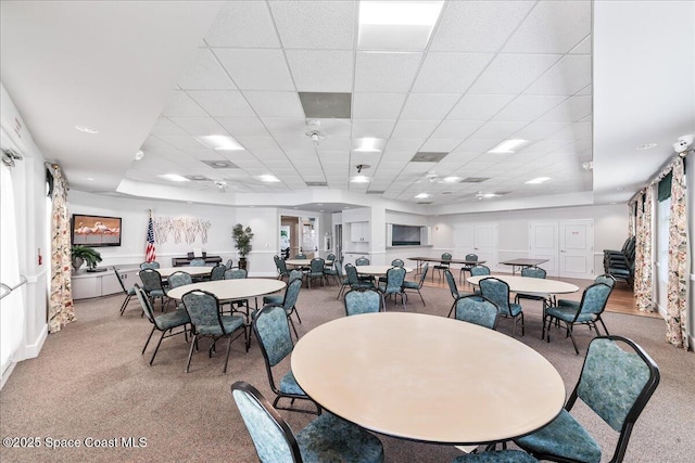 4160 Aberdeen Cir, Rockledge, FL 32955 - dining area with light colored carpet and a paneled ceiling