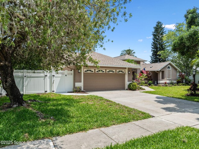 3360 Fort Sumter St, Melbourne, FL 32934 - ranch-style home featuring a gate, stucco siding, an attached garage, driveway, and a shingled roof