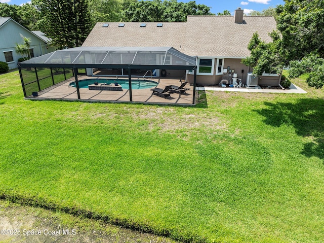 3360 Fort Sumter St, Melbourne, FL 32934 - outdoor pool with a patio area, a lawn, glass enclosure, and central AC