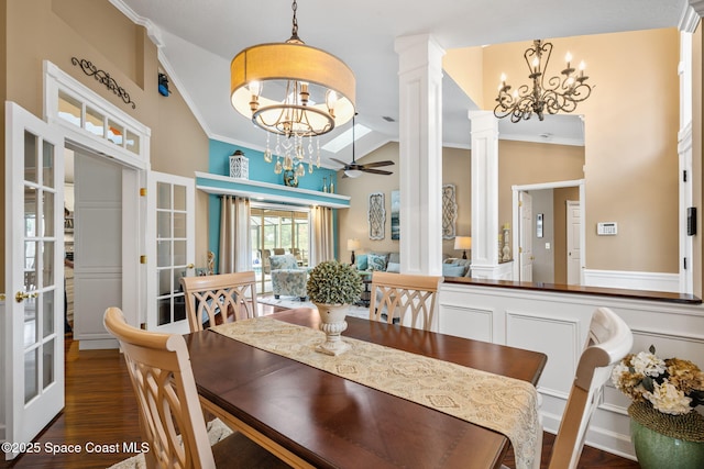3360 Fort Sumter St, Melbourne, FL 32934 - dining space featuring a chandelier, ornate columns, ornamental molding, a ceiling fan, and french doors