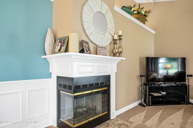 3360 Fort Sumter St, Melbourne, FL 32934 - detailed view of a multi sided fireplace, carpet, and wainscoting