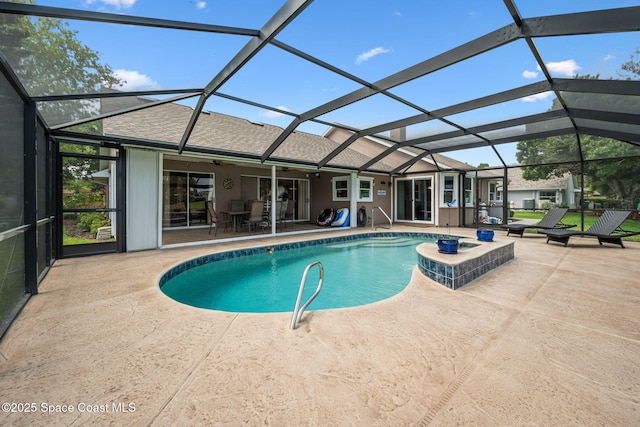 3360 Fort Sumter St, Melbourne, FL 32934 - outdoor pool with a patio, glass enclosure, and a jacuzzi