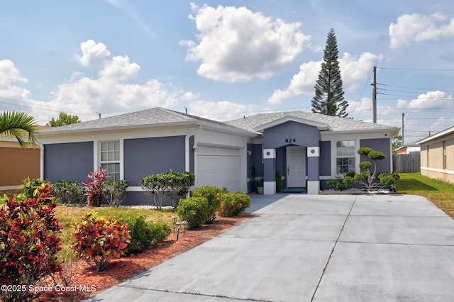824 Temple St, Cocoa, FL 32922 - ranch-style house with stucco siding, concrete driveway, and an attached garage
