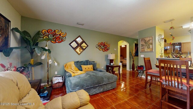 824 Temple St, Cocoa, FL 32922 - living area with arched walkways and wood finished floors
