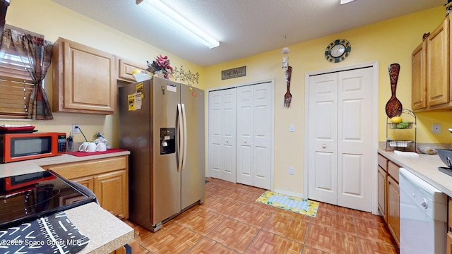 824 Temple St, Cocoa, FL 32922 - kitchen with white appliances and light countertops