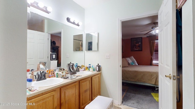 824 Temple St, Cocoa, FL 32922 - ensuite bathroom featuring double vanity and a ceiling fan