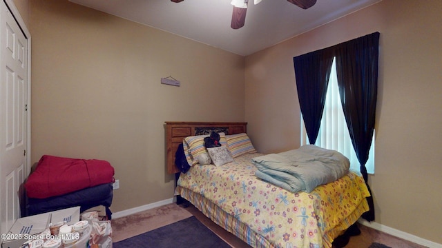 824 Temple St, Cocoa, FL 32922 - carpeted bedroom featuring baseboards and a ceiling fan