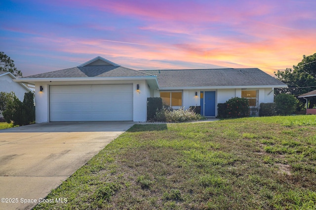 1573 Eagle Ave NW, Palm Bay, FL 32907 - ranch-style house featuring an attached garage, concrete driveway, a lawn, and stucco siding