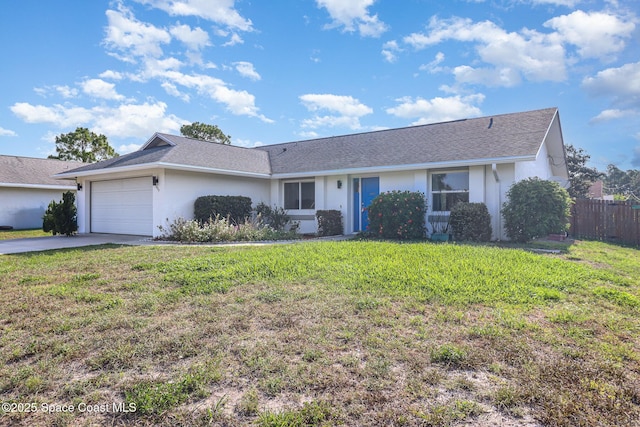 1573 Eagle Ave NW, Palm Bay, FL 32907 - single story home featuring stucco siding, driveway, an attached garage, and roof with shingles