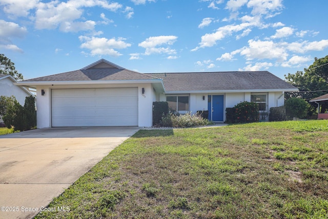 1573 Eagle Ave NW, Palm Bay, FL 32907 - ranch-style home featuring stucco siding, a garage, driveway, and a front lawn