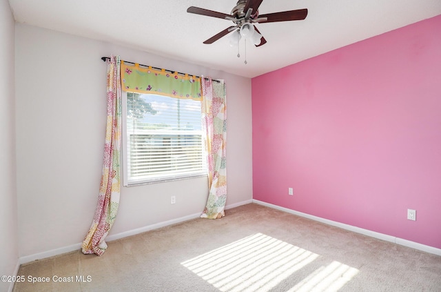 1573 Eagle Ave NW, Palm Bay, FL 32907 - carpeted spare room featuring ceiling fan and baseboards