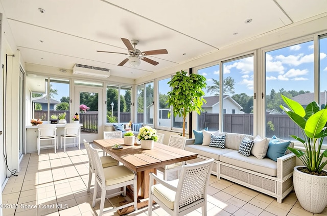1573 Eagle Ave NW, Palm Bay, FL 32907 - sunroom / solarium featuring a wall unit AC, tile patterned flooring, and healthy amount of natural light