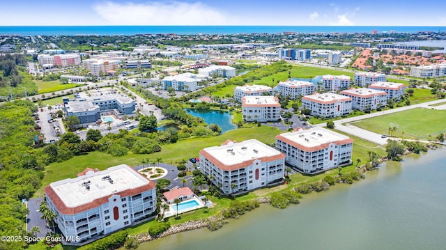 8984 Puerto Del Rio Dr Unit 202, Cape Canaveral, FL 32920 - view of urban area with a nearby body of water and apartment complex / building