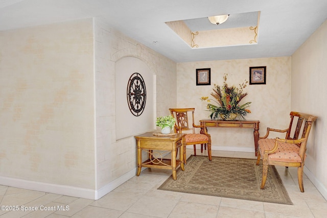8984 Puerto Del Rio Dr Unit 202, Cape Canaveral, FL 32920 - sitting room featuring baseboards