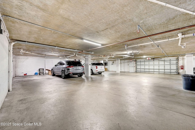8984 Puerto Del Rio Dr Unit 202, Cape Canaveral, FL 32920 - view of parking garage
