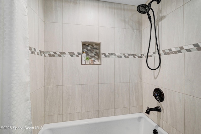 8984 Puerto Del Rio Dr Unit 202, Cape Canaveral, FL 32920 - bathroom with shower / bath combo with shower curtain