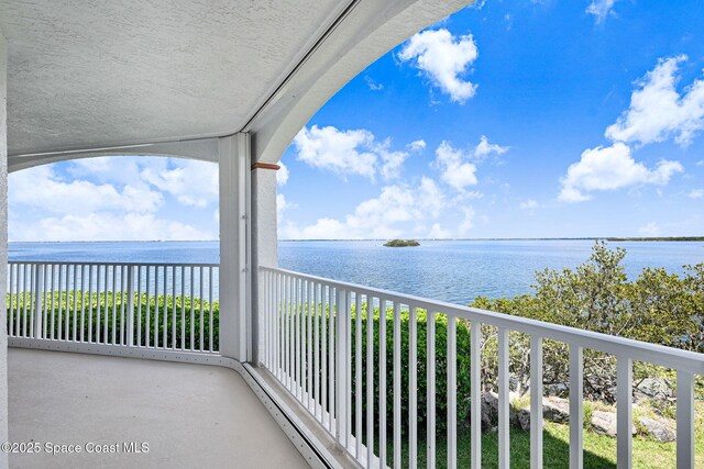8984 Puerto Del Rio Dr Unit 202, Cape Canaveral, FL 32920 - balcony featuring a water view