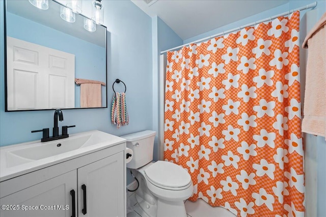 3046 Sebastian Ln, Melbourne, FL 32935 - bathroom with vanity, toilet, and a shower with curtain