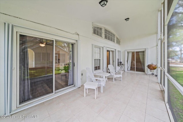 3046 Sebastian Ln, Melbourne, FL 32935 - sunroom with vaulted ceiling and a ceiling fan