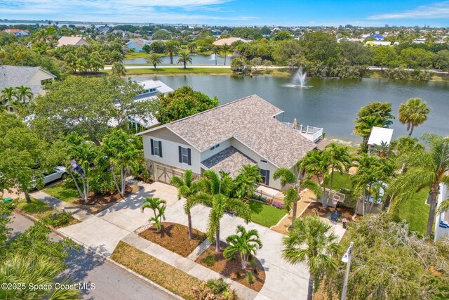 420 Tortoise View Cir, Satellite Beach, FL 32937 - view of subject property featuring a nearby body of water and a tree filled landscape