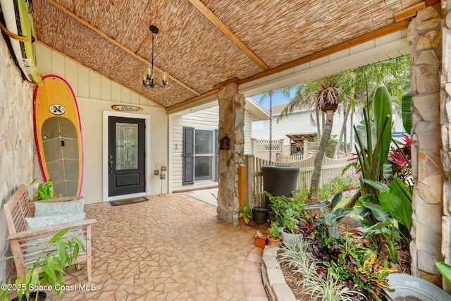 420 Tortoise View Cir, Satellite Beach, FL 32937 - doorway to property featuring stone siding