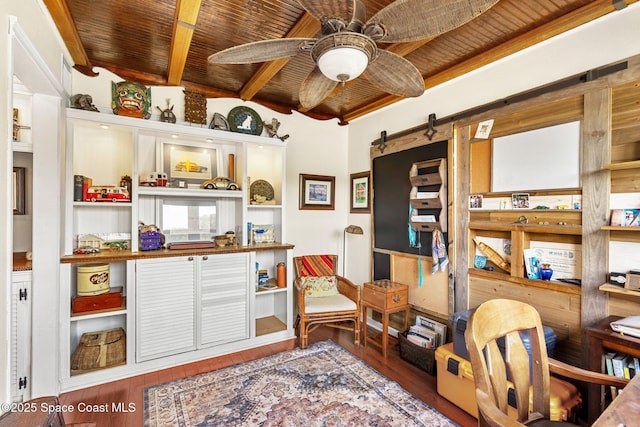 420 Tortoise View Cir, Satellite Beach, FL 32937 - office space with wood ceiling with exposed beams, wood finished floors, a ceiling fan, and a barn door